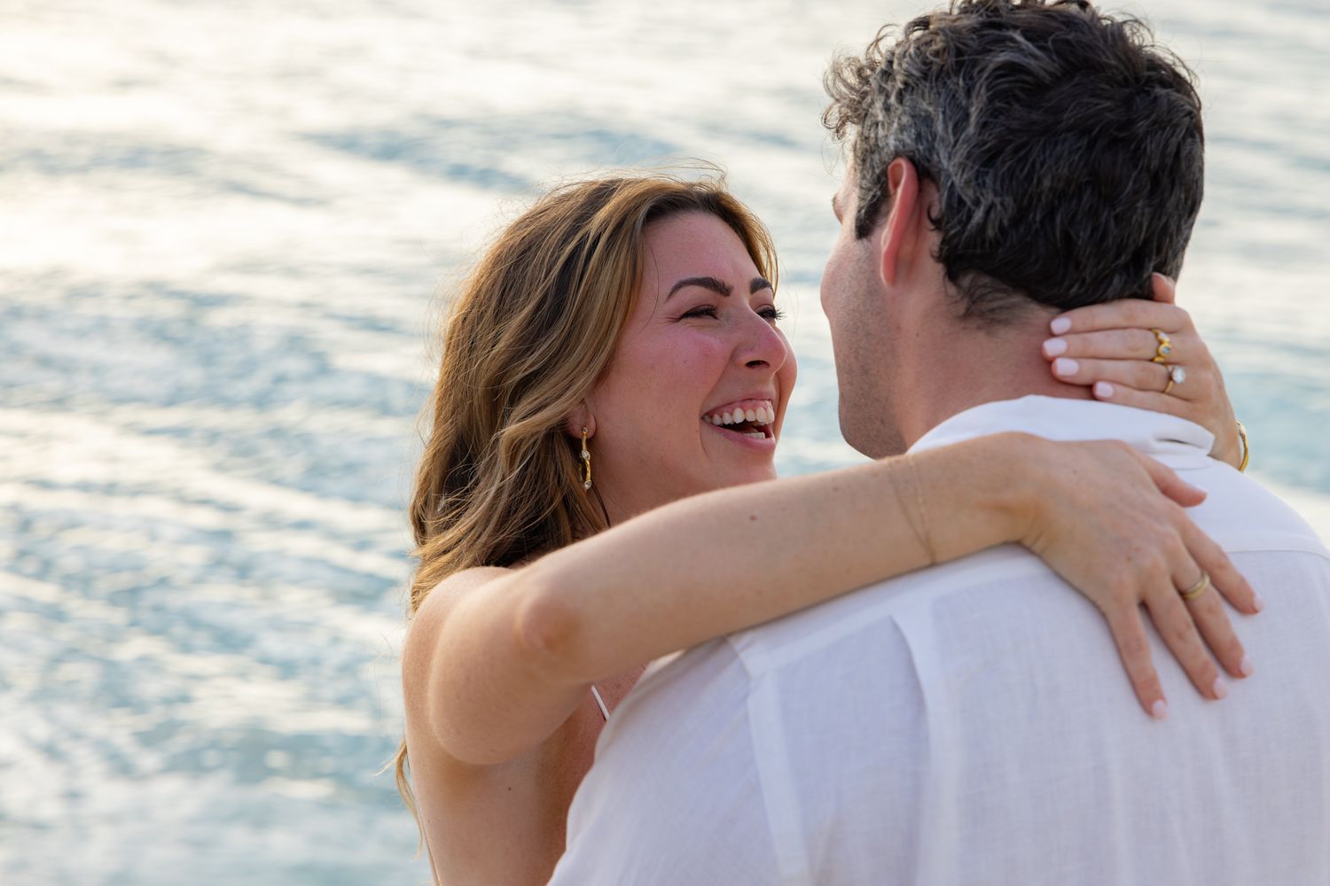 A couple celebrating their island wedding