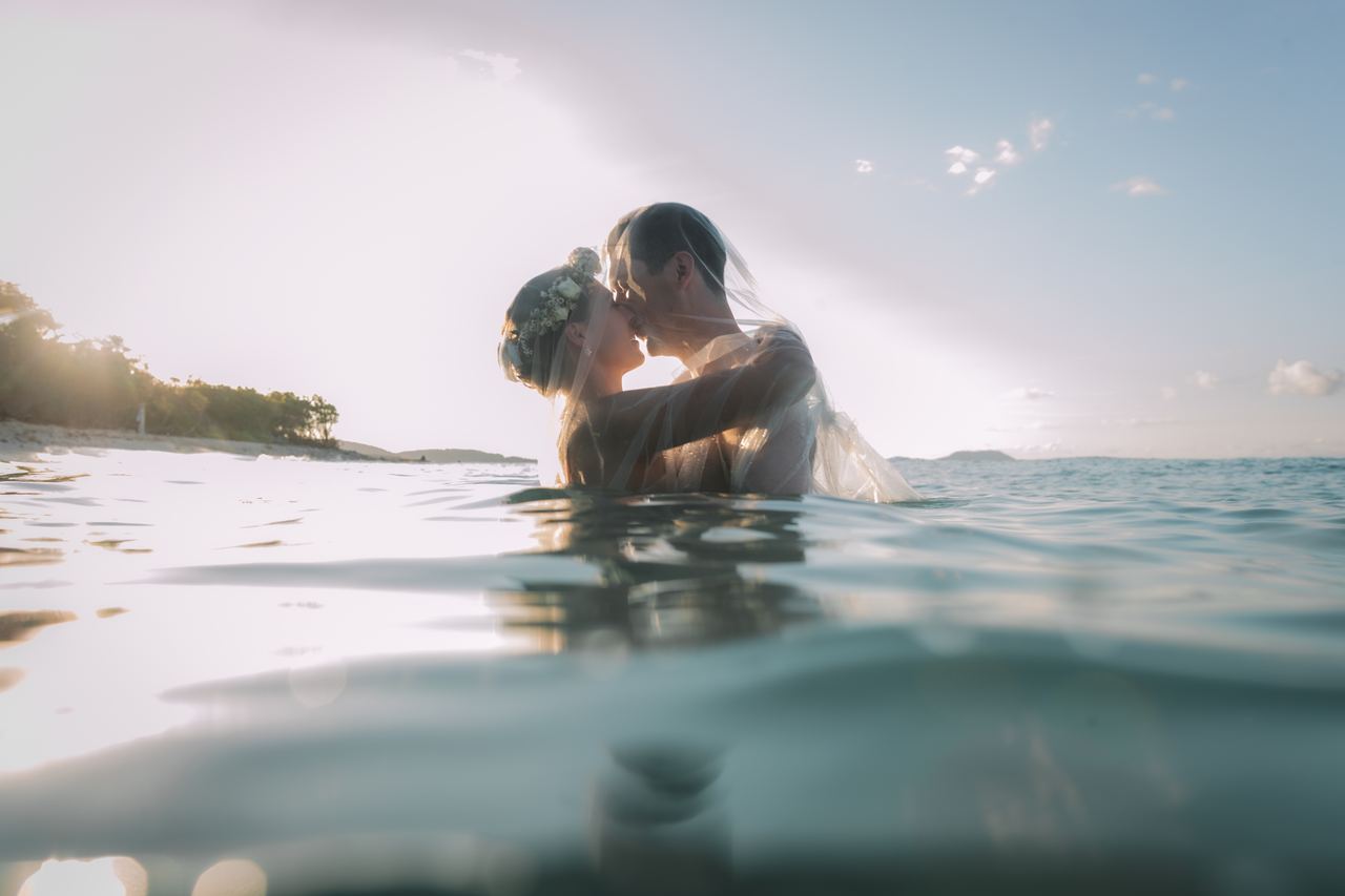 Virgin Islands wedding couple kissing in the water